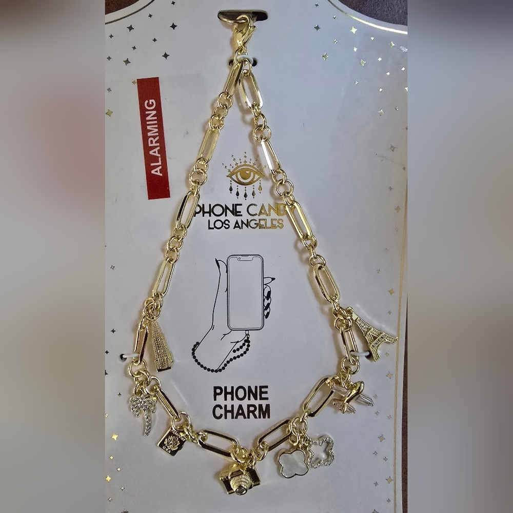 EYE CANDY Gold Tone Phone Charm with Eiffel Tower, Plane, Camera, Etc